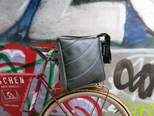 Upcycling bag made from used motorcycle hose and amry tent linen